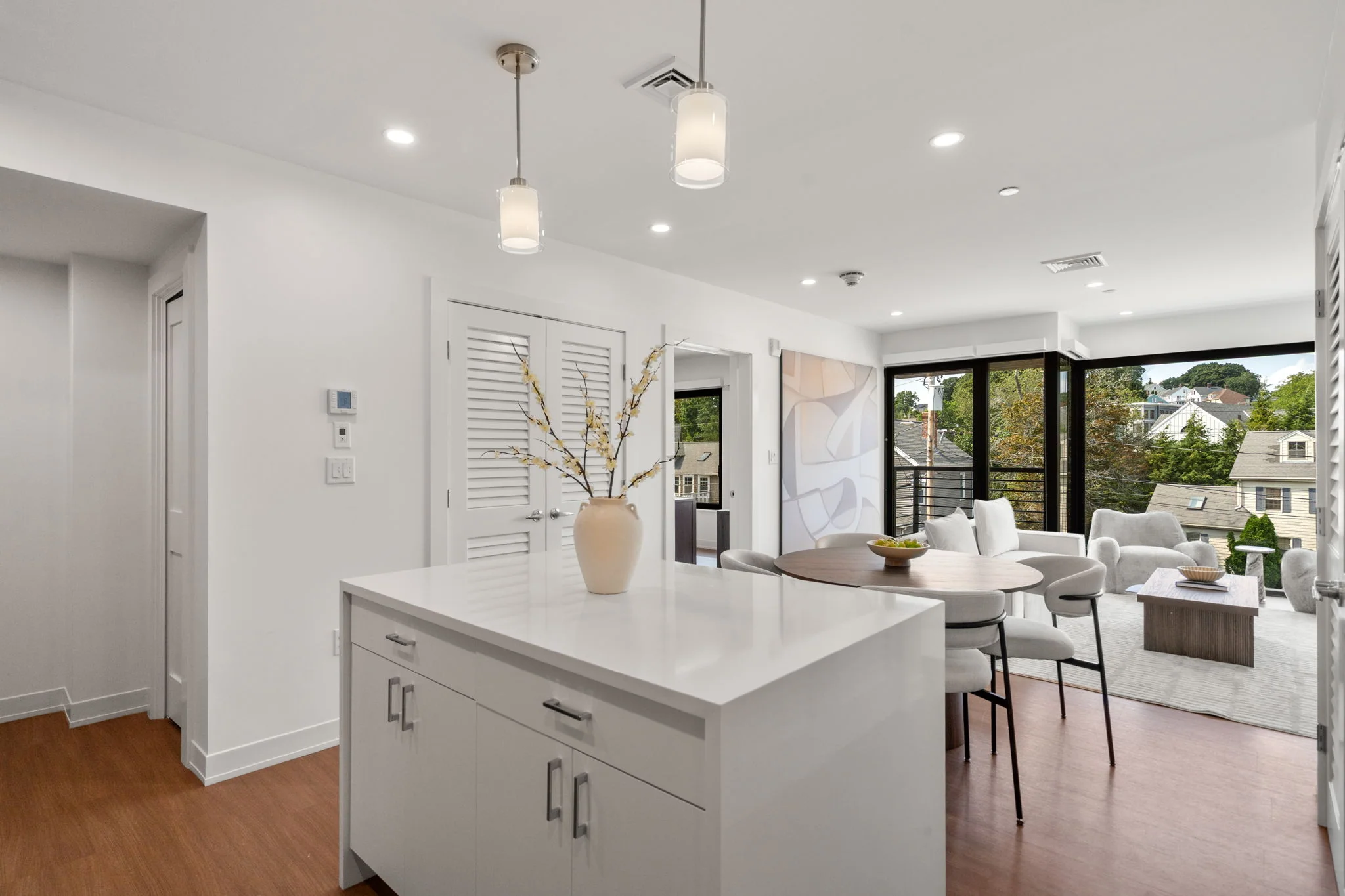 View from the kitchen island toward the dining area and living room