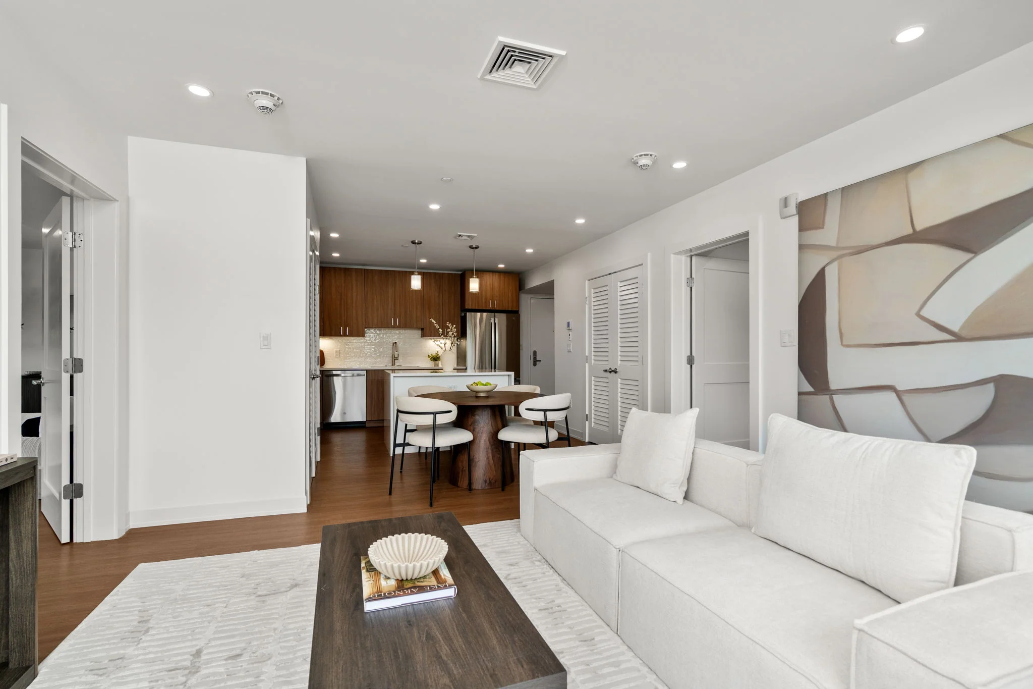Living room looking toward the open-plan dining area and kitchen